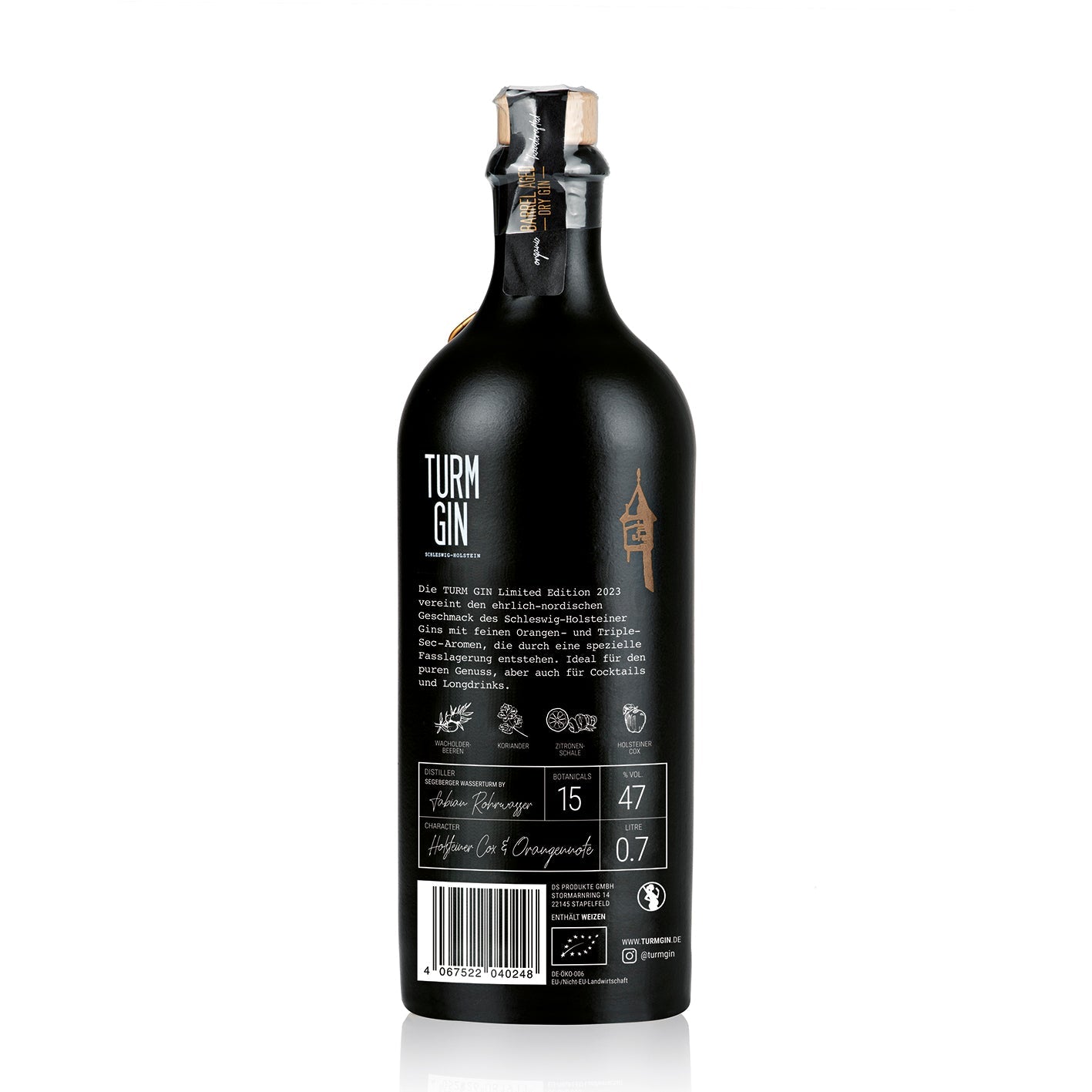 Rückseite der schwarzen Flasche TURM GIN Limited Edition 2023 mit Beschreibung und Botanicals.